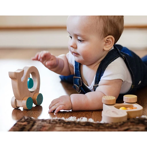 Petit Collage - 100% organikus fejlesztő fa gurulós játék - bálna