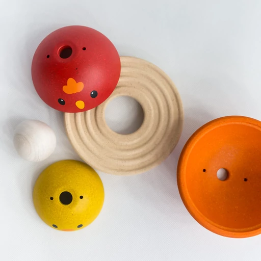 Plan Toys - Csibe fészekrakó